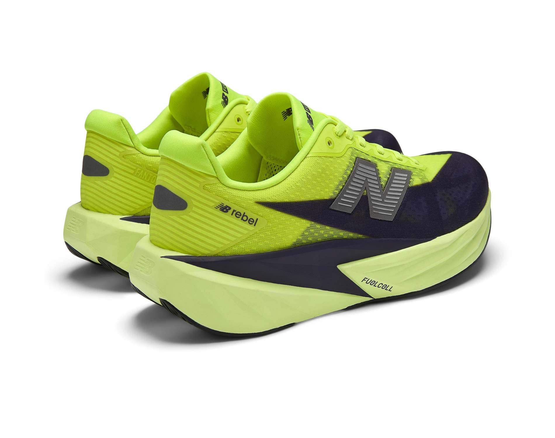 Neon green running shoes with black accents on a white background