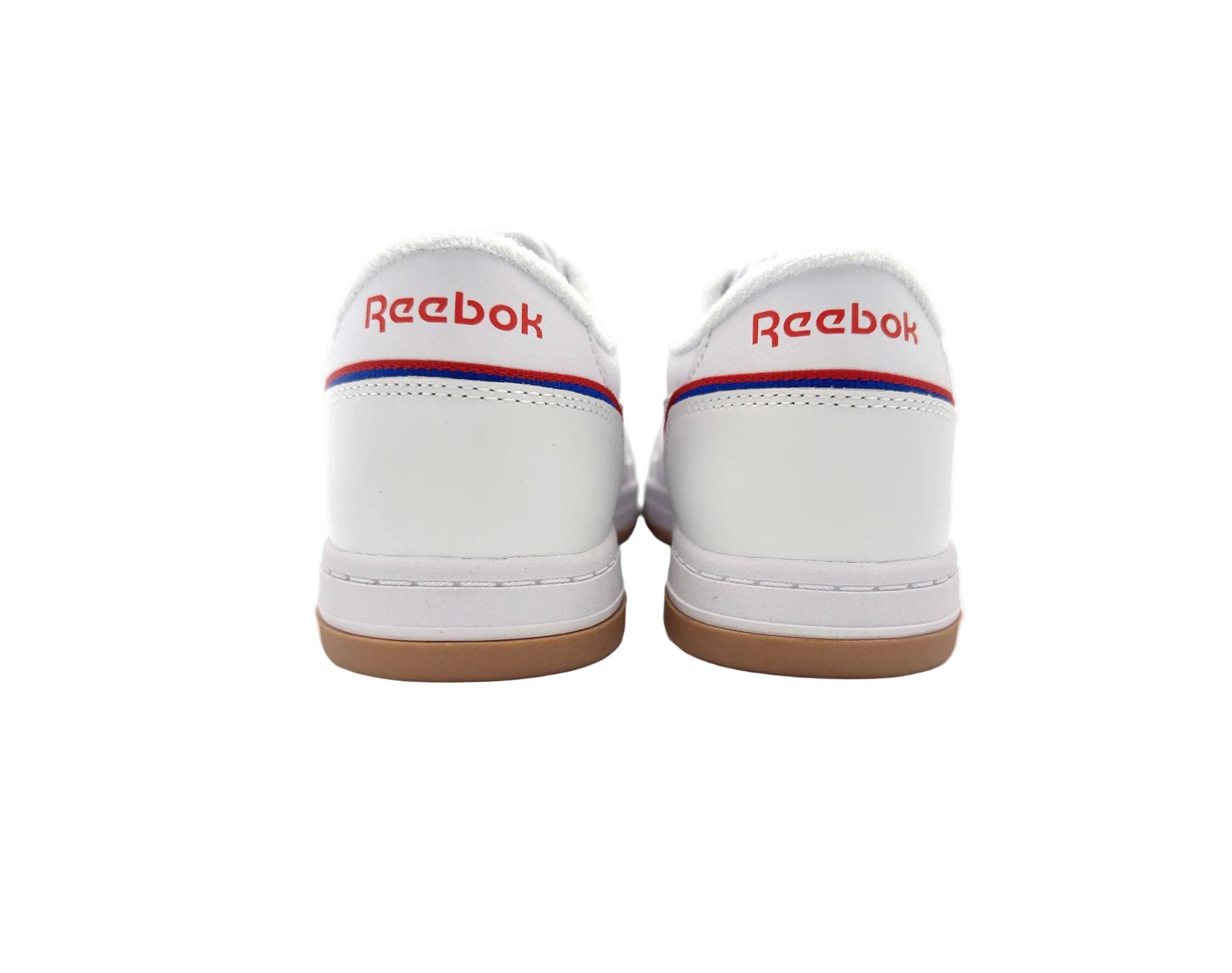 White Reebok sneakers with red and blue accents on a white background