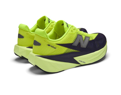 Neon green running shoes with black accents on a white background