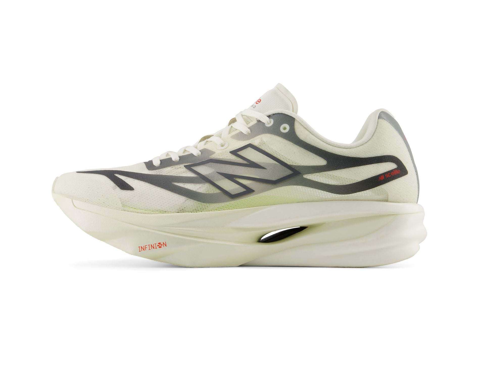 A New Balance running shoe in off-white and dark gray, featuring a thick cushioned sole and red branding details, shown from a side profile on a white background.