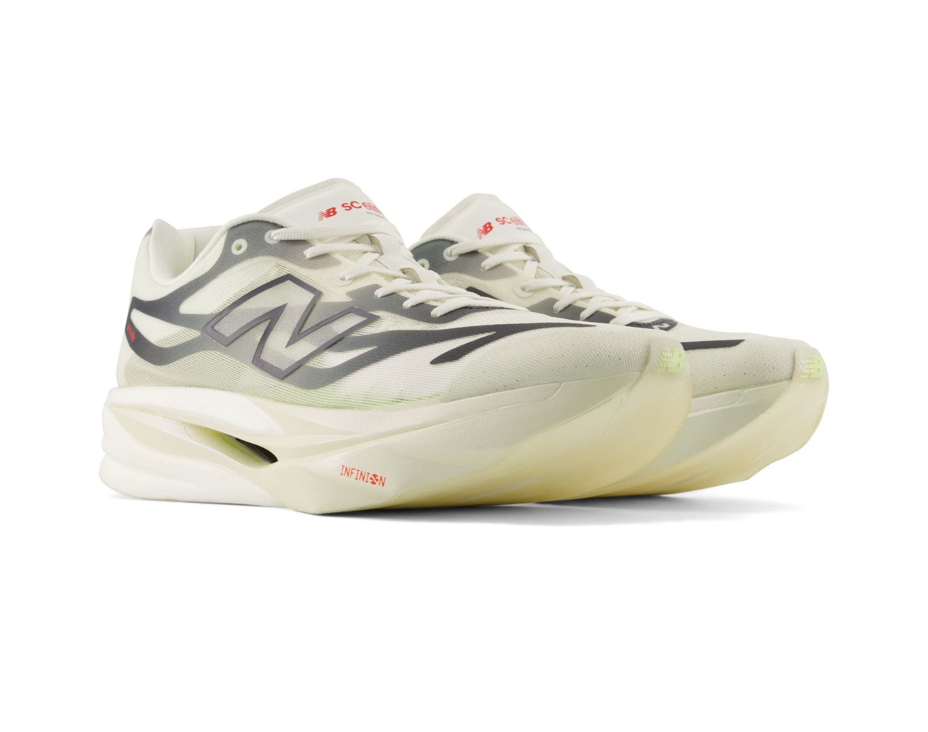 A pair of New Balance 1000 v2 running shoes in a light cream/off-white colorway with dark gray flame accents and red branding details, shown against a plain white background.